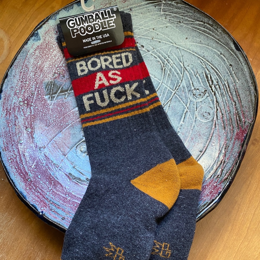 NWT Super Cozy Socks- with the writing “Bored as Fuck”.